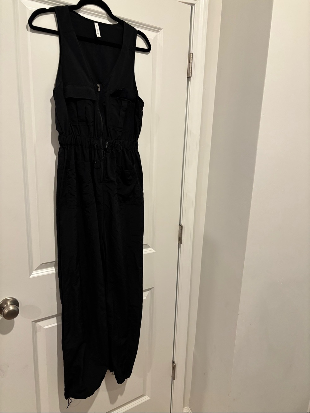 Black Jumpsuit 
Brand Love tree 
Size medium